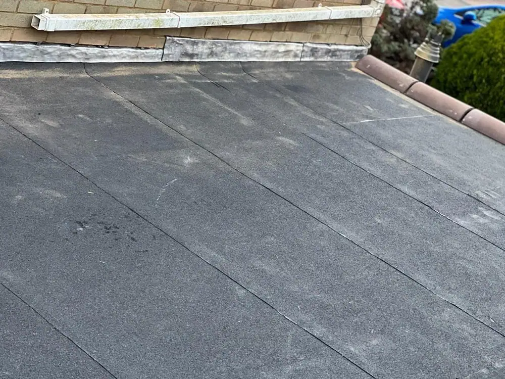 Finished felt flat roof with a drip edge