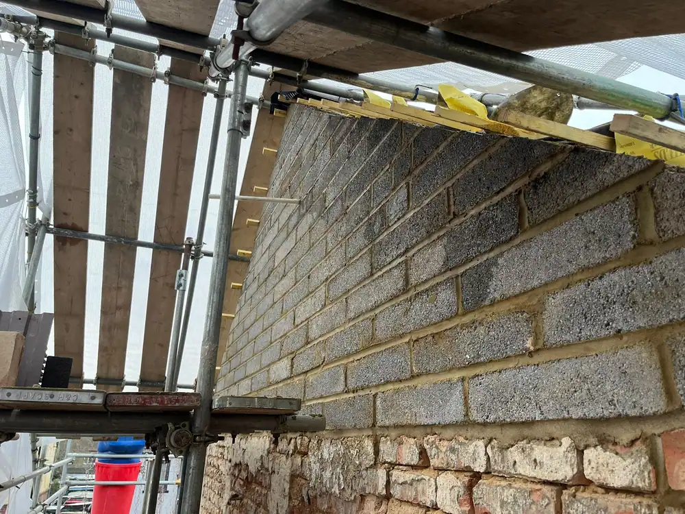 Blockwork gable built up inside the scaffold