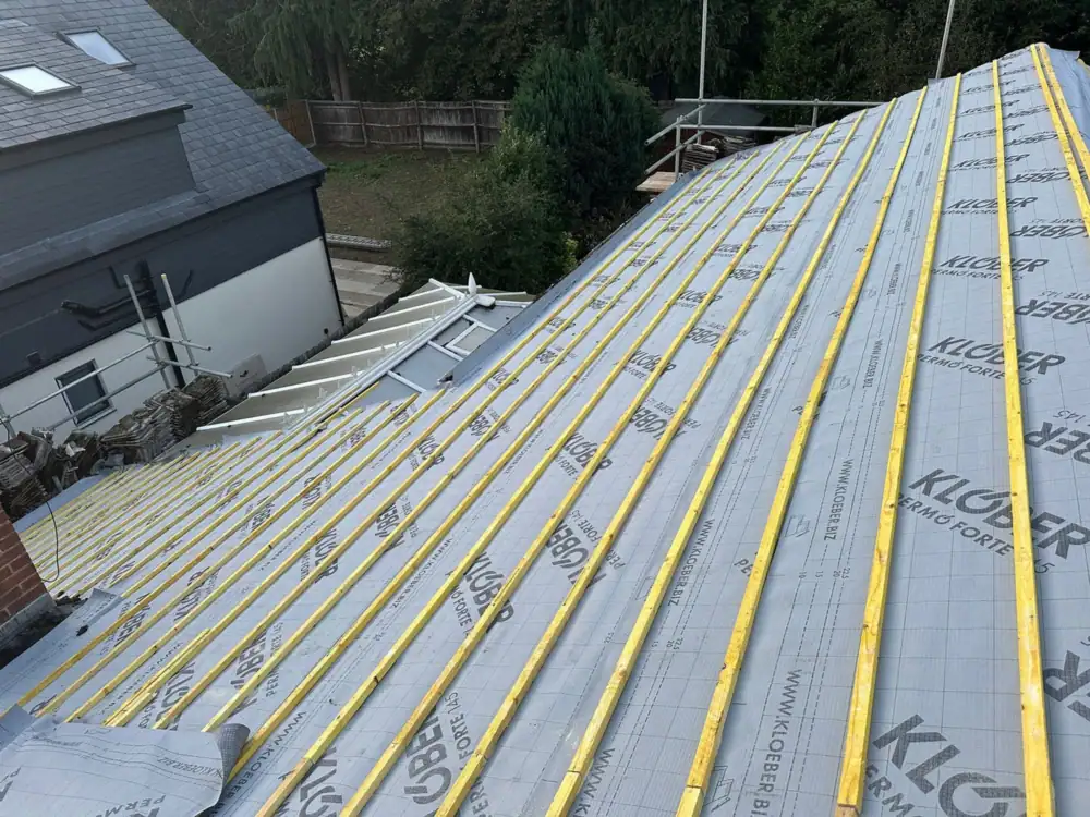 Roofers in Barnet: whole roof slope covered in Klober membrane with new battens