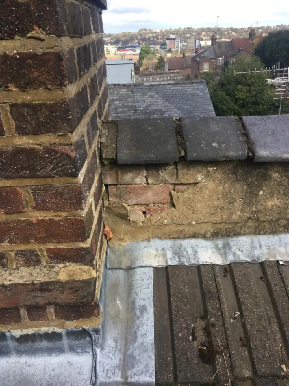 Lead flashing at a chimney abutment