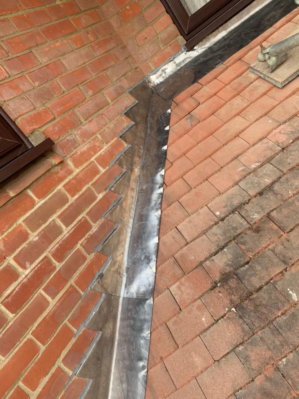 New lead flashing where the roof meets the wall