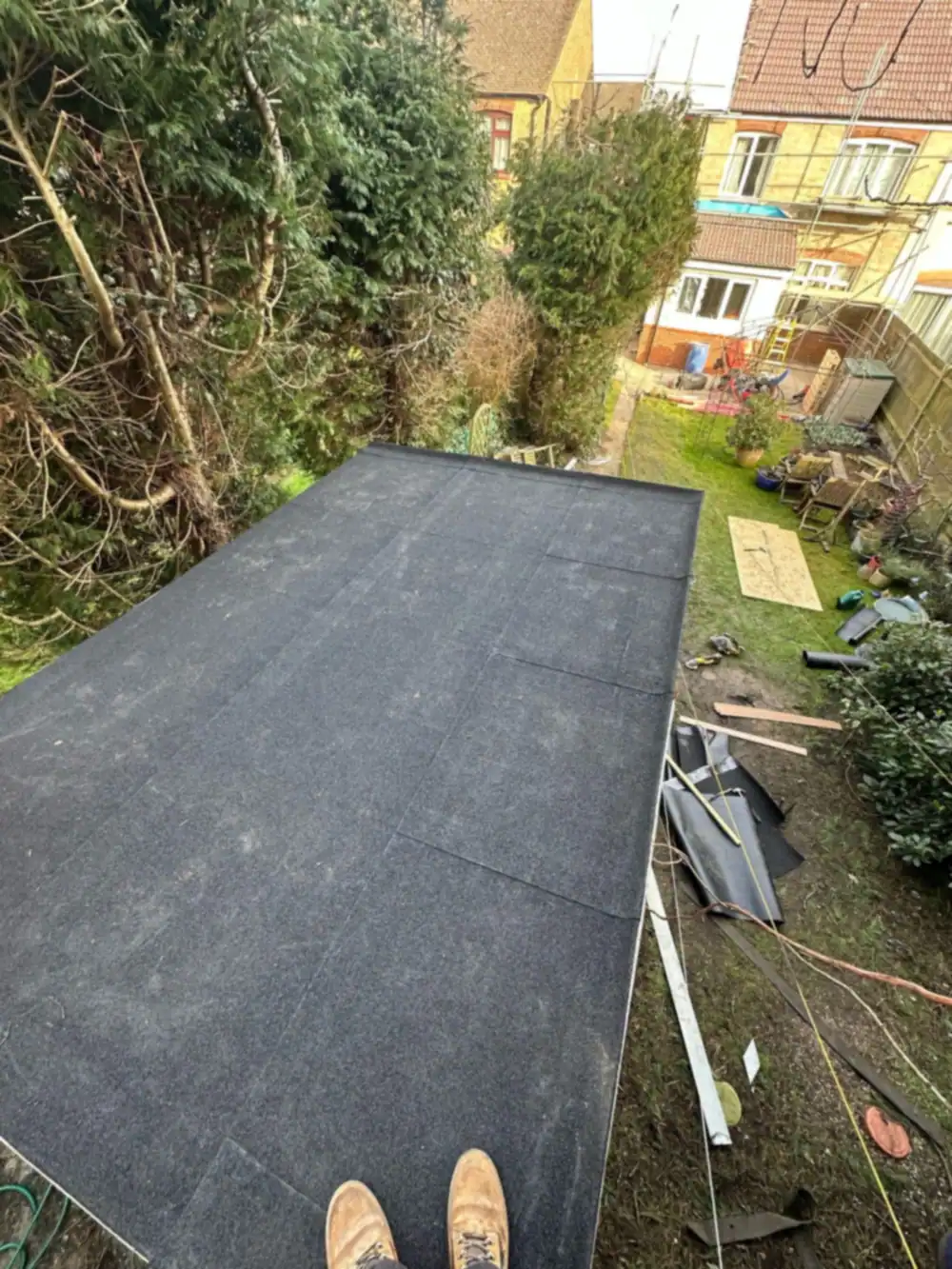 Long felt flat roof on a rear extension seen from above