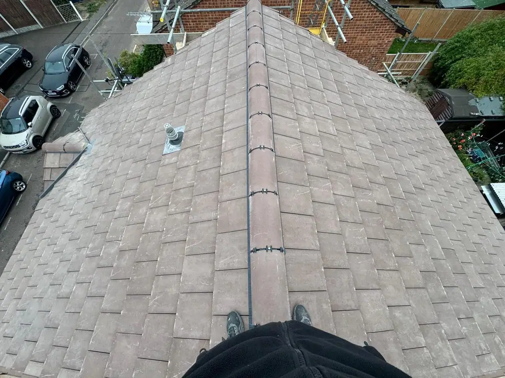 New tile ridge seen from the top of the roof