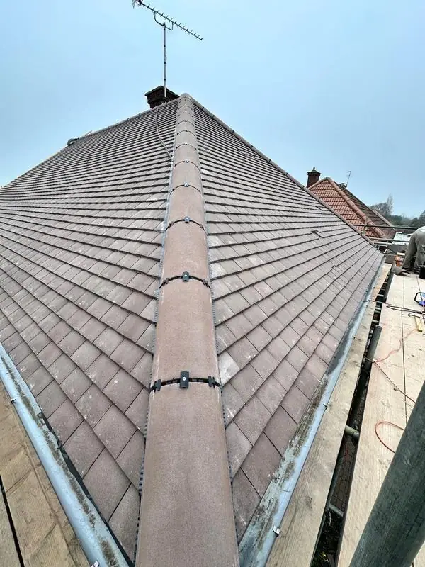 New tile roof and ridge from the scaffold
