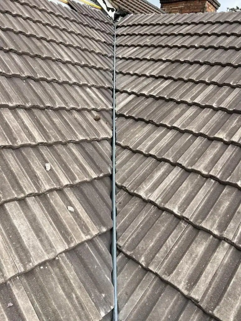 New tiled valley with a clean lead-lined centre on a pitched roof
