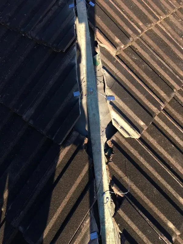 Close-up of a tiled valley after roof tile replacement