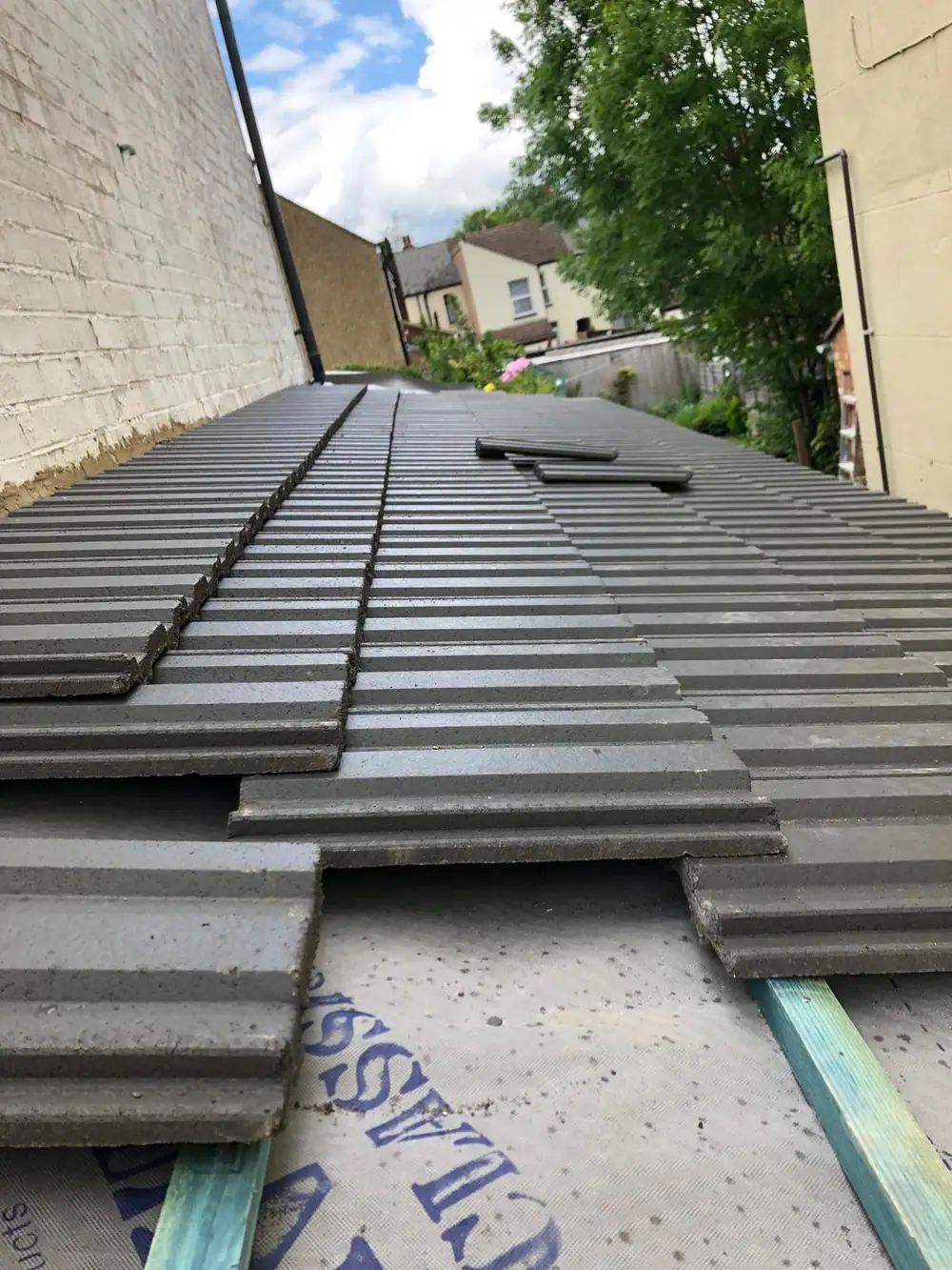 New tiles laid on battens over membrane